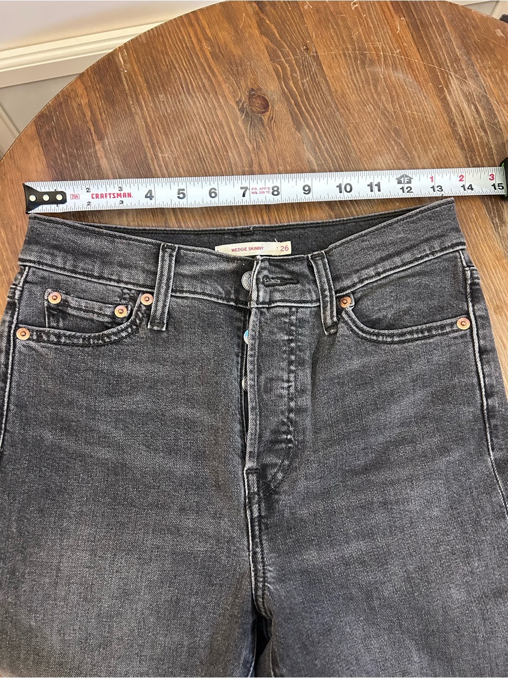 Levi High-Rise Washed Black/Warm Gray Skinny Jeans